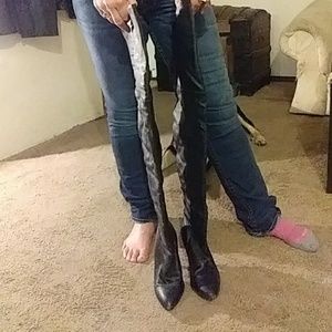 Black thigh high leather boots